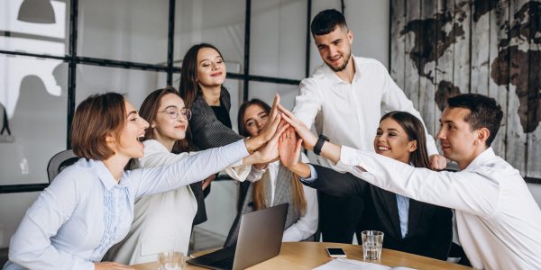 Group of people working out business plan in an office